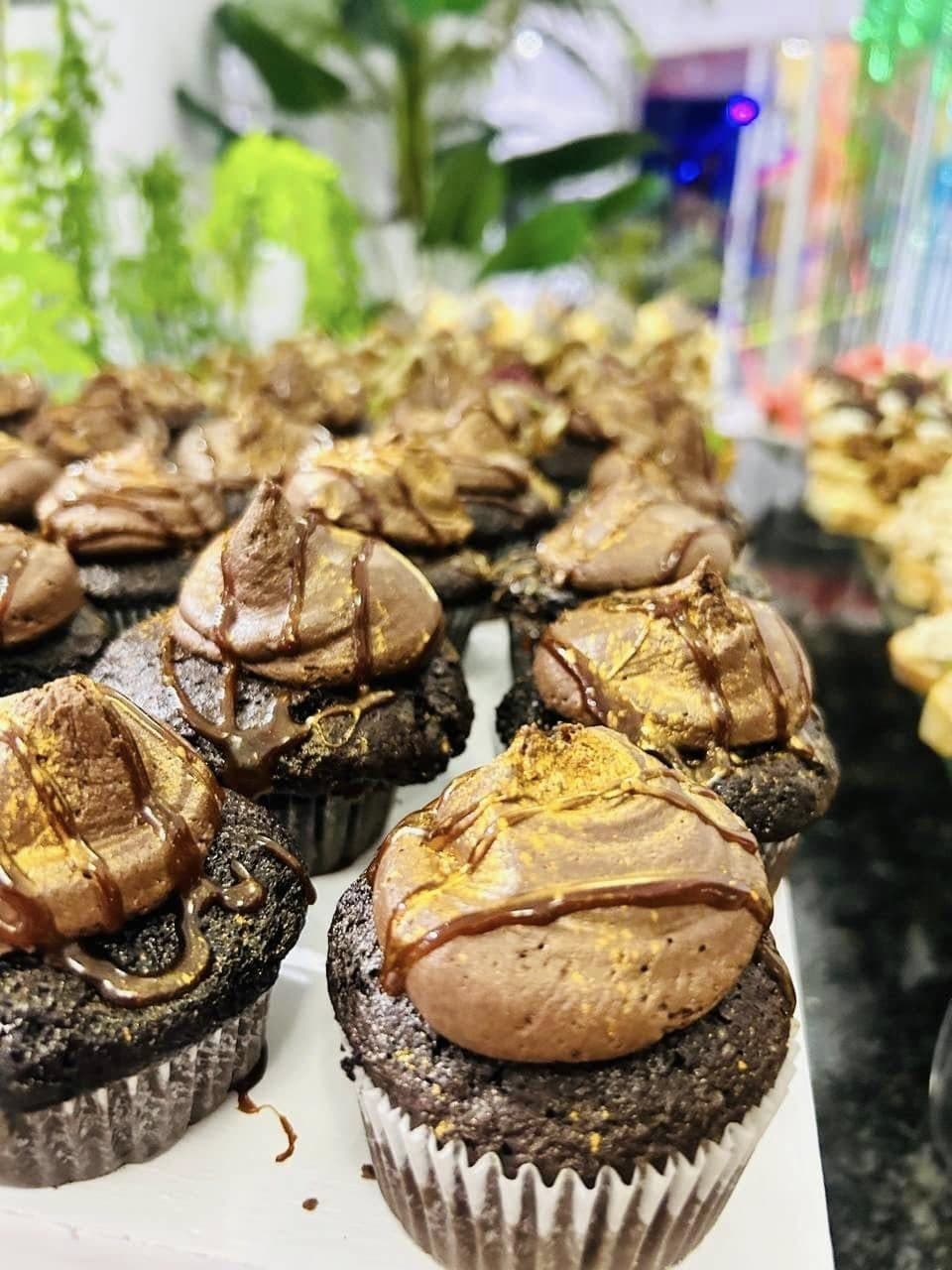 Chocolate cupcakes finished with swirls of chocolate frosting